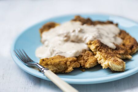 close up of golden american southern chicken fried steakの写真素材