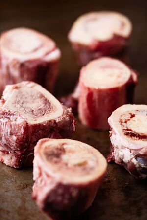 close up of rustic raw uncooked beef bone marrow