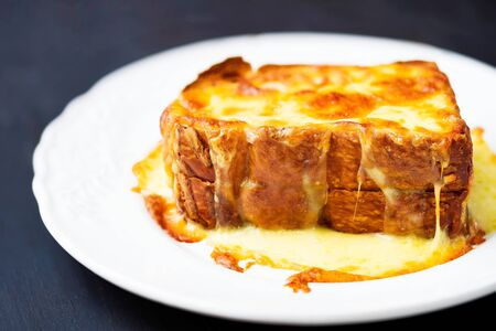 close up of rustic american comfort food grilled cheese sandwichの写真素材