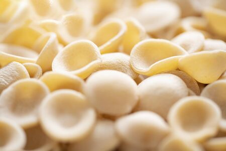 close up of dried italian orecchiette pasta blur defocusedの写真素材
