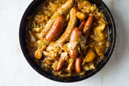 close up of rustic cabbage stew with sausageの写真素材