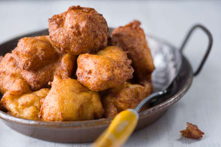 close up of french fried potato puffs