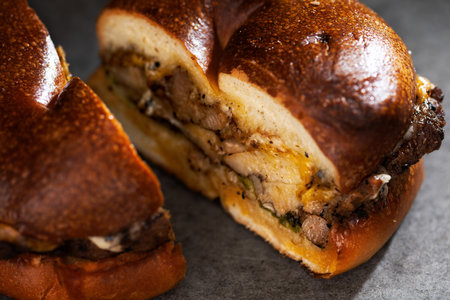 close up of american roast chicken bagel sandwich