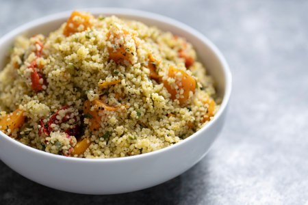 close up of a bowl of cous cuoscous  pumpkin saladの写真素材