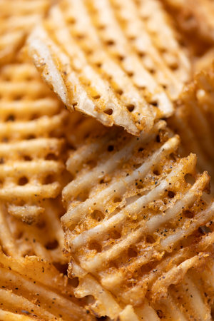 close up of rustic  golden waffle crosscut potatoesの写真素材