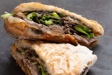 close up of rustic italian roast beef sandwichの写真素材