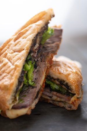 close up of rustic italian roast beef sandwichの写真素材