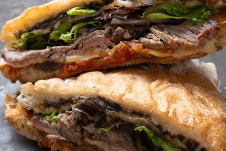close up of rustic italian roast beef sandwichの写真素材
