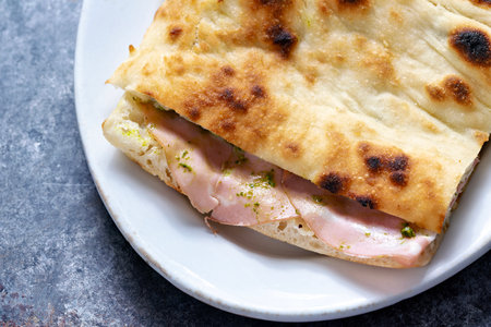 close up of rustic italian bologna sandwich