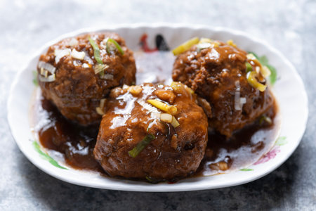 close up of a plate of chinese traditional braised lion's head meat ballの写真素材