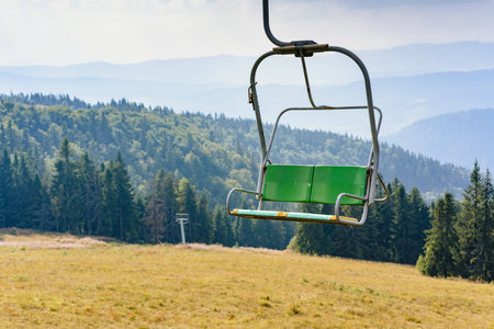 Lift in the Carpathians with mountains and fir-trees in the background. Summer timeの写真素材