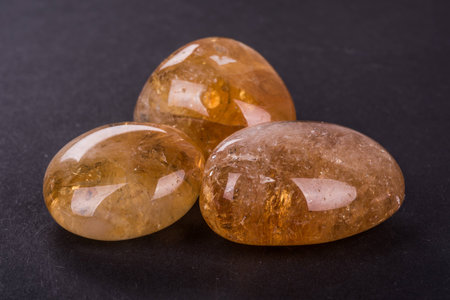 CItrine geode on black background. Beautiful natural crystal gemstone.