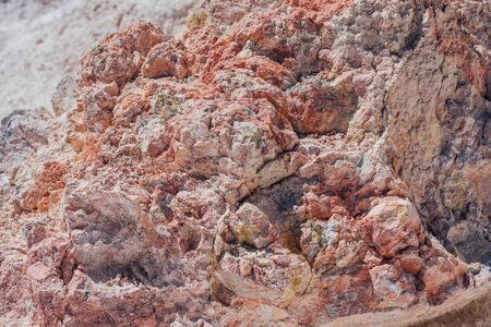 Red sulfur crystals in the Nisyros volcano crater.の写真素材