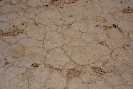Cracked earth in volcano craterの写真素材