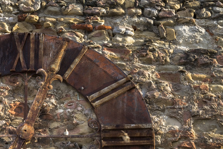 Old church clock on a brick wallの写真素材
