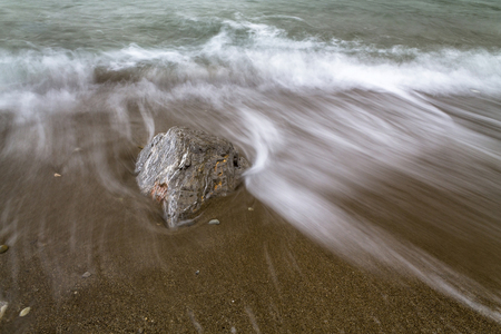 Gloomy sand beach sceneの写真素材