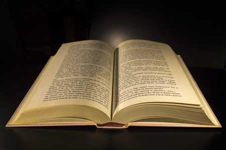 Open book on a black background