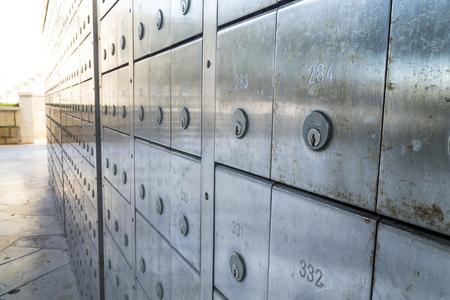 Wall of deposit safe boxes in a bankの写真素材