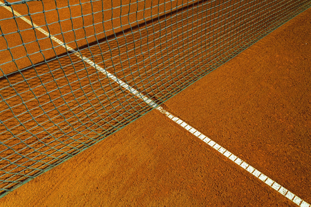 Empty tennis clay court on a sunny dayの写真素材