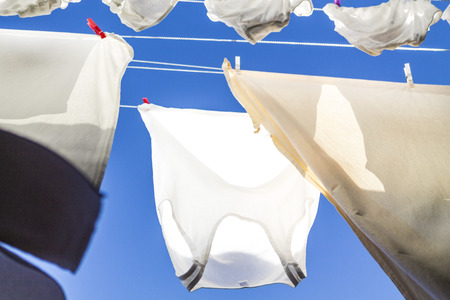 Drying laundry on a blue sky