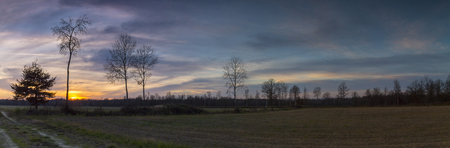 Beautiful colorful countryside sunsetの写真素材