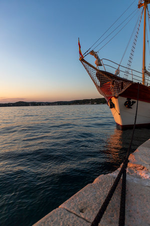 Sunset seascape with a luxury yacht in Croatiaの写真素材