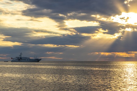 Sunset seascape with a luxury yacht in Croatiaの写真素材