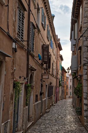 Streets of old town of Rovigno on a gloomy dayの写真素材