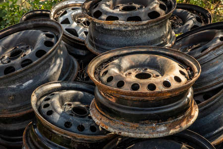 Pile of old steal rims thrown away into natureの素材 [FY310176111256]