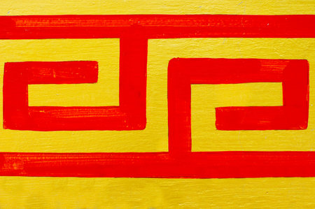 Chinese pattern with the red lines on the yellow background の写真素材