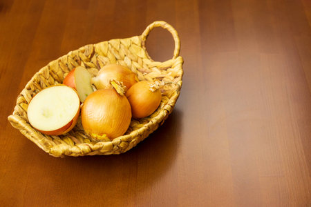 Basket with onionsの写真素材