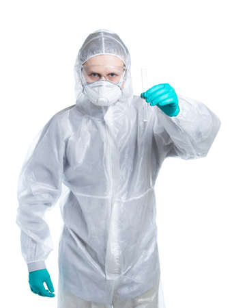 The epidemic of the Chinese coronavirus. a man in a protective suit shows you a virus in a tube. Isolatedの写真素材