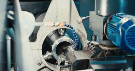 Metalworking milling process. Industrial metal processing with CNC vertical mill.の写真素材