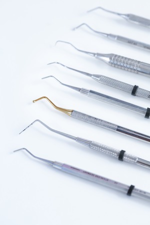 Various dental instruments - burs, pluggers, burnishers, periodontal scalers and probesの写真素材