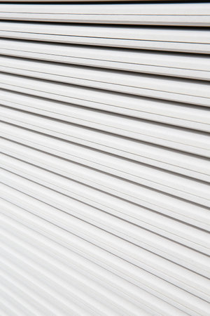 Stack of white plasterboard panels