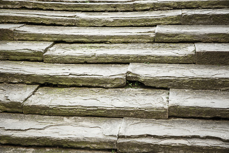 Unique ancient set of weathered, but solid stone stairs. Progression, archaism and solidness concept. Textured effect background.の写真素材
