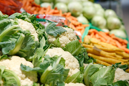 Unpacked, fresh vegetables in a self-service supermarket. Zero-waste movement and philosophy, sustainable trade and organic grocery concept.の写真素材