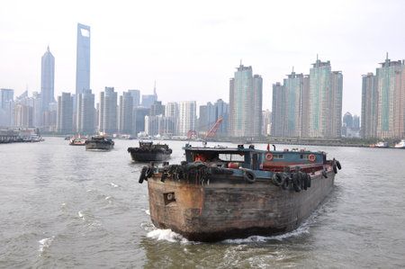 Boat in the city riverの写真素材