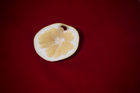 A slice of fresh pomeloの写真素材