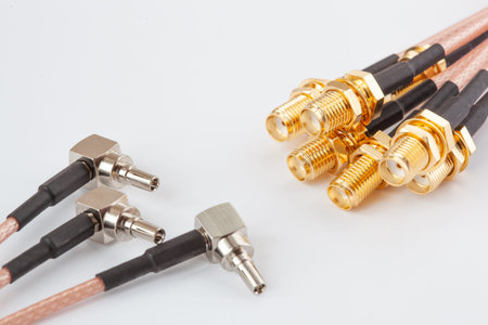 High-frequency ipx to sma female cable connector with gold plated pins. Coaxial cable with connectors for special telecommunication equipment.の写真素材