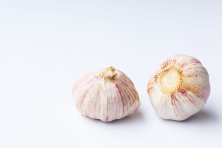 two garlic isolated on white background, include clipping pathの写真素材