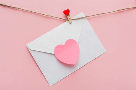 sting clothes peg with red heart and love letter on the rope. valentines day conceptの写真素材