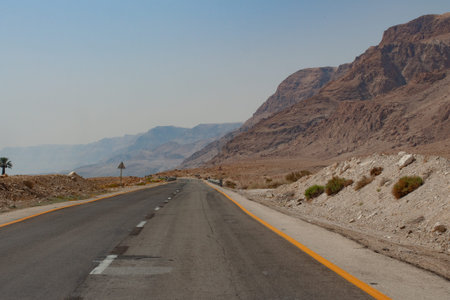 Perfect empty mountain road at a hot summer day in Israel