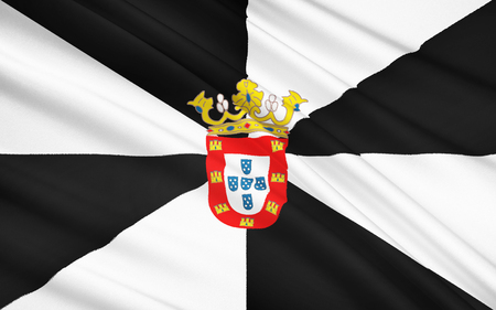 The national flag of the State of the Spanish autonomous cities of Ceuta is a four rectangle divided diagonally across the black and white triangles. At the center of the flag depicts the city emblem.の写真素材