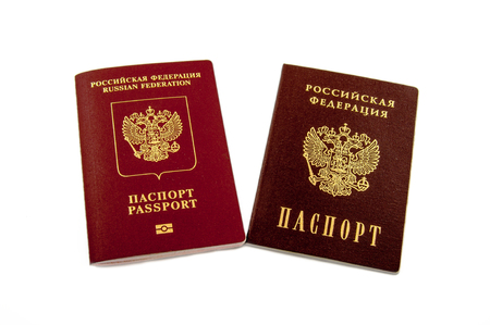 Two passports - internal Russian passports and the passport of the Russian Federation isolated on white backgroundの写真素材