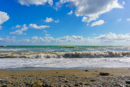 Stormy Black Sea and blue sky in Sochi, Krasnodar region