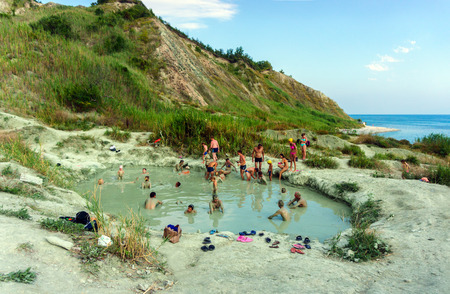 Russia, Krasnodar region - Black sea 21.07.2016: People take a mud bath of blue clay in Inal Bay on the Black Seaのeditorial素材