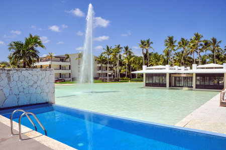 Punta Cana, Dominican Republic - March 21, 2010: Hotel Catalonia Royal Bavaro, Beach hotel resort swimming pool and fountainのeditorial素材