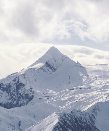 Beautiful ice Mountains with cloudy skyの写真素材
