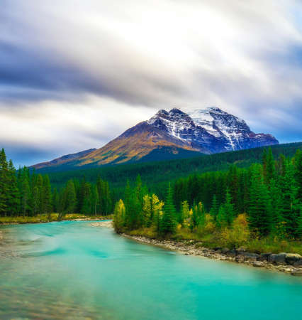 beautiful view of mountains and sweet water lake with green treesの写真素材
